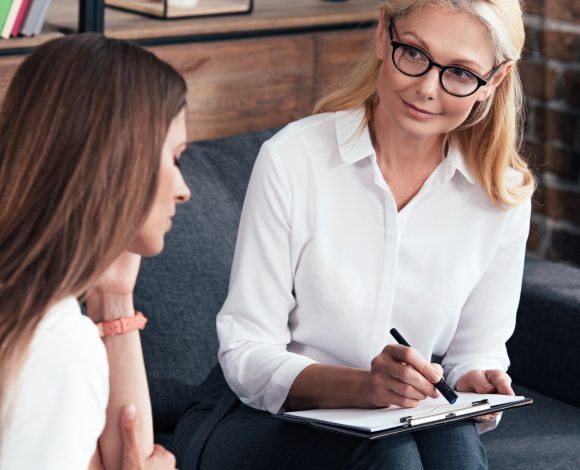 Caucasian female counseling listening to client