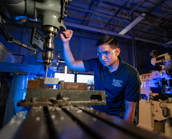 precision machining student in the lab