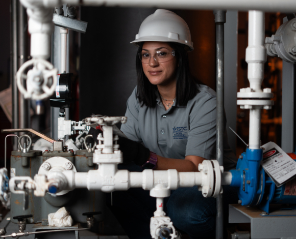 process operations female student practicing in the lab at TSTC