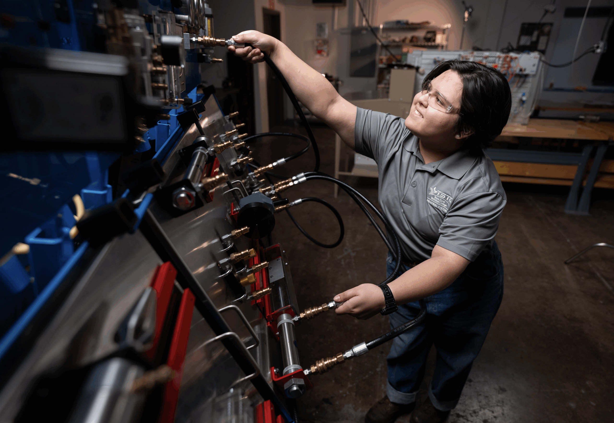 a student working on a machine